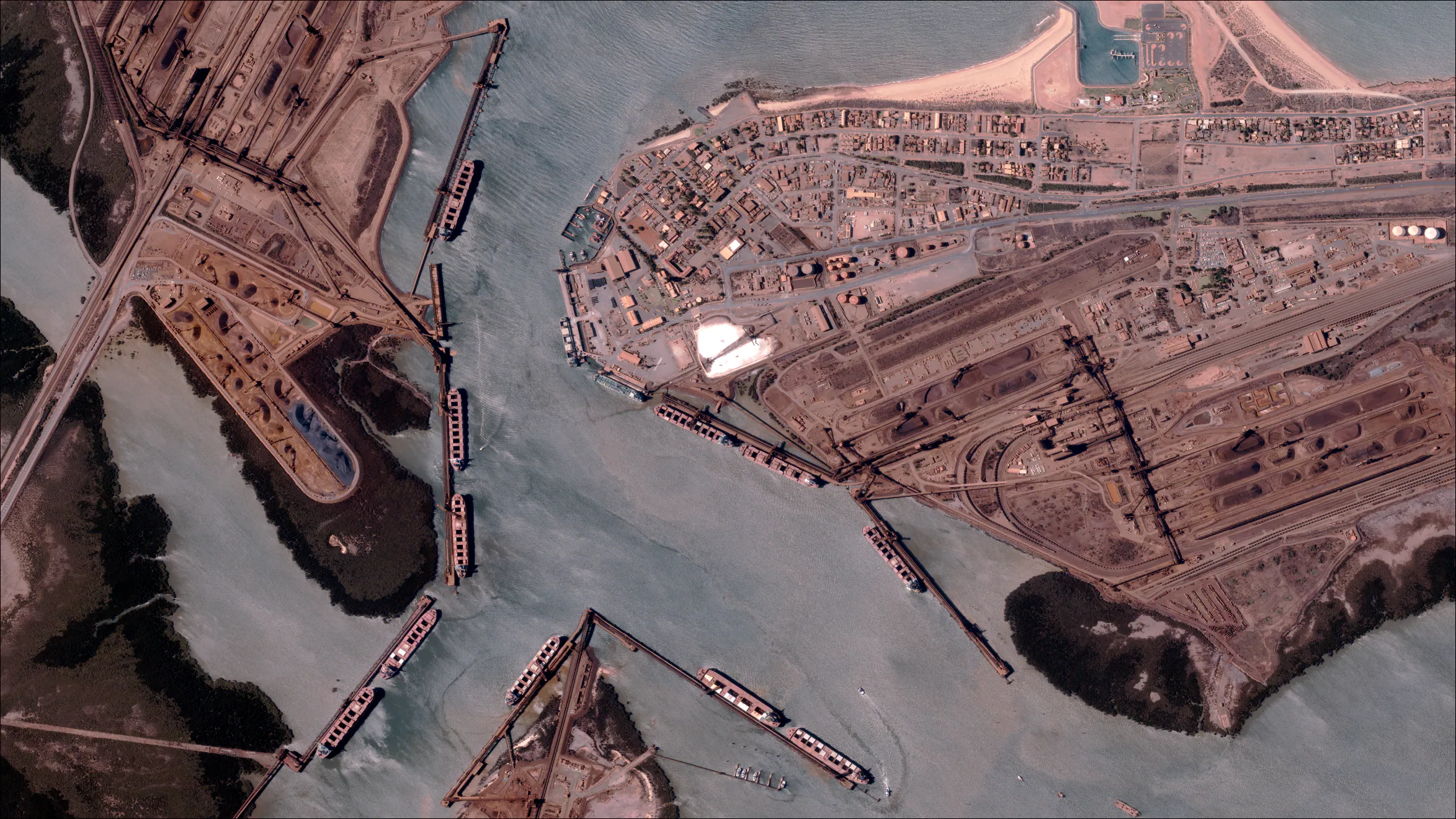 Satellite imagery of bulk carriers loading iron ore at Port Hedland, Australia
