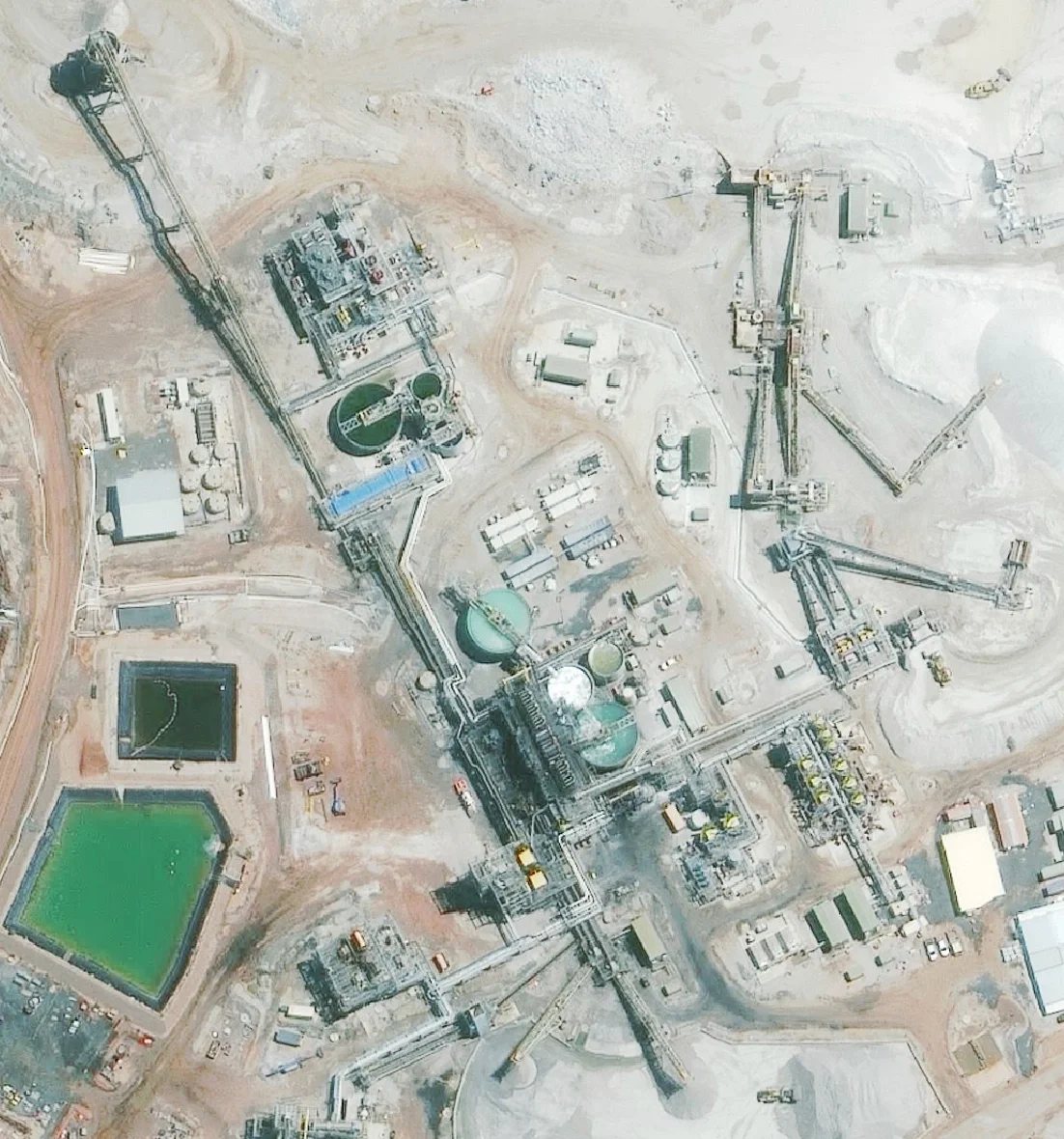 30cm satellite imagery of a Goldfields mine processing plant, conveyors and tailings ponds