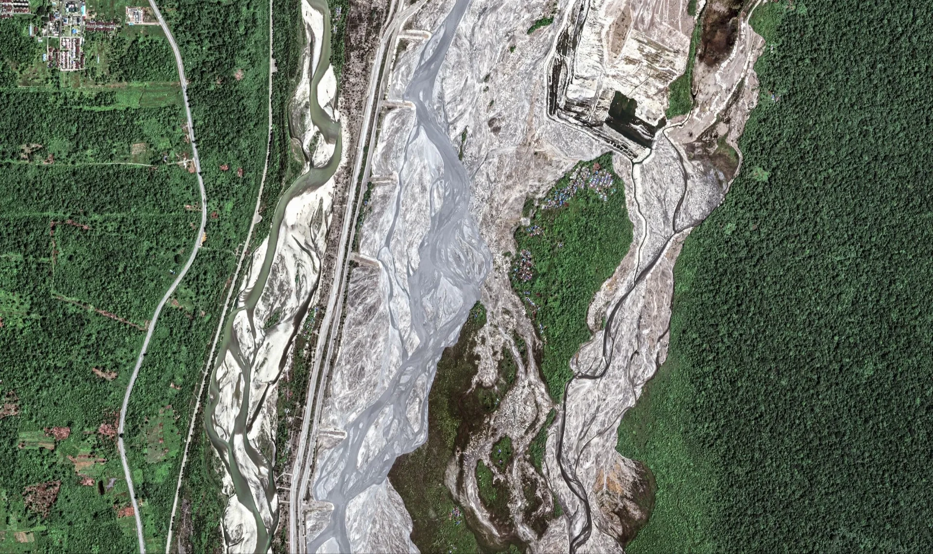Satellite imagery showing mining environmental impact assessment