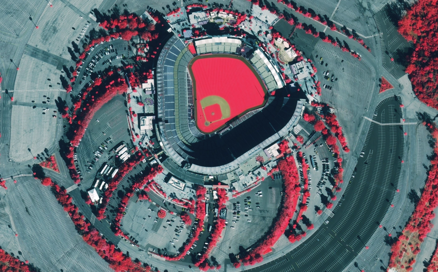 Colour infrared satellite imagery of Dodger Stadium showing vegetation in red.