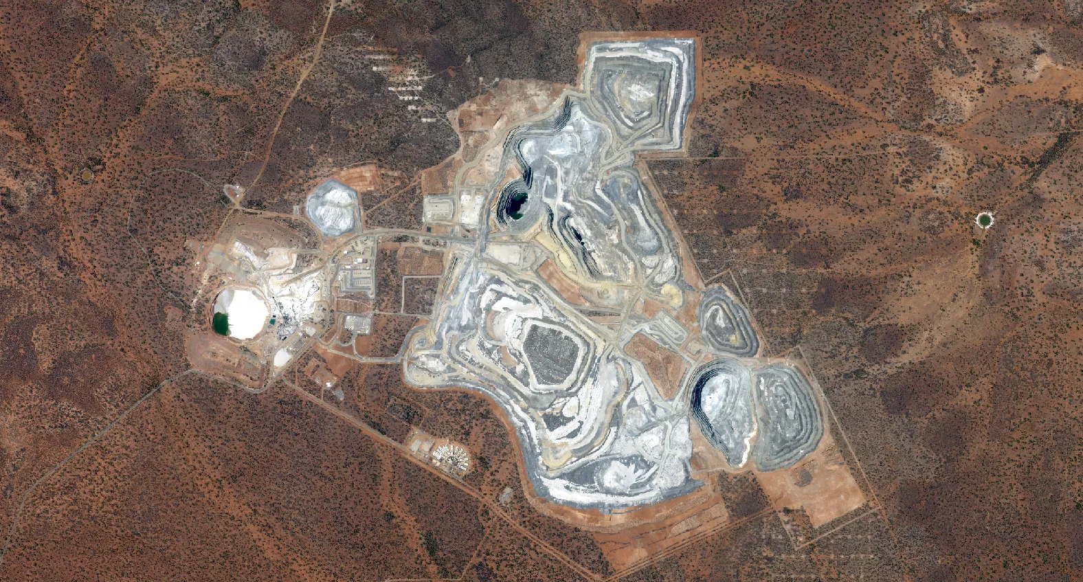 High-resolution satellite imagery of the same mine site captured in 2025 showing changes over time.