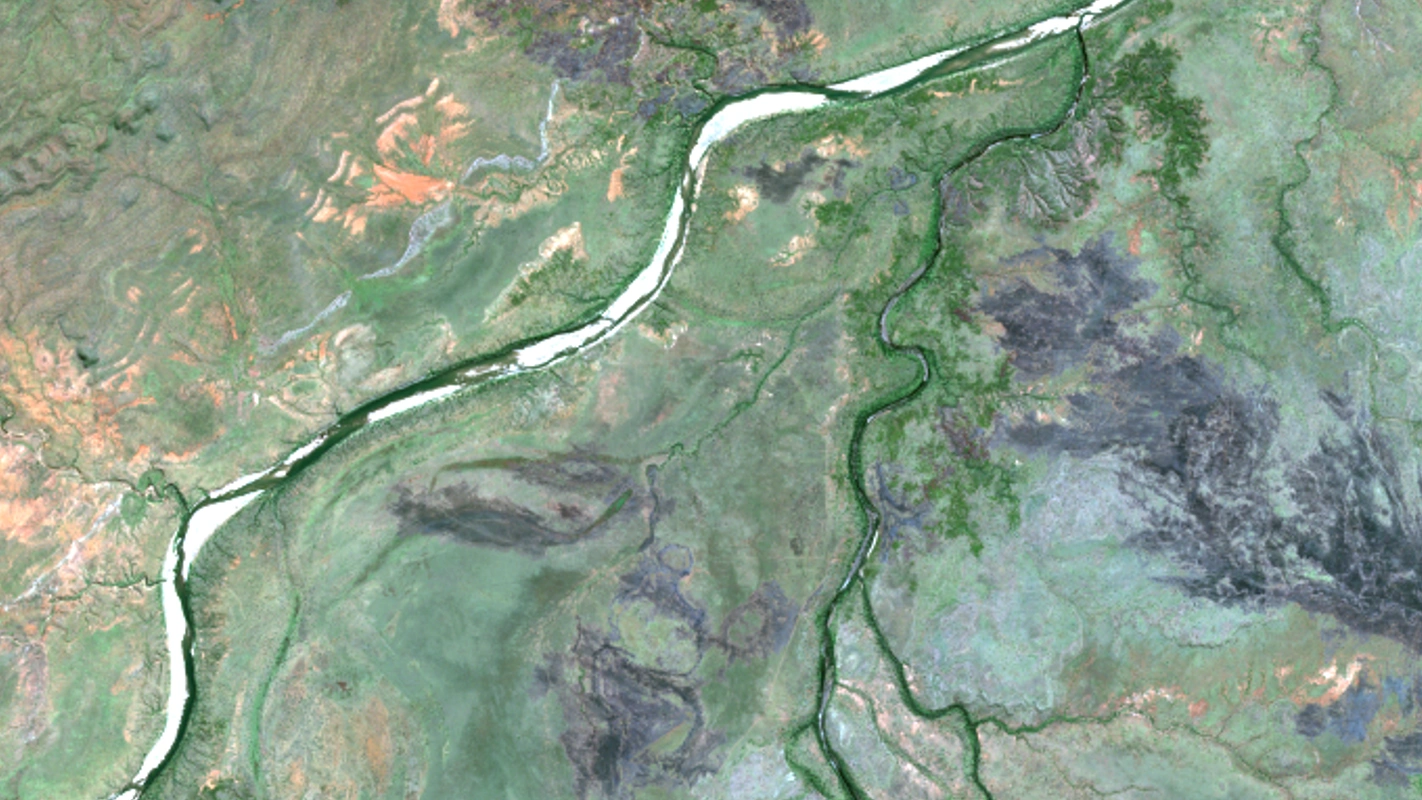 Natural colour Sentinel-2 image of rangeland at Mt Kinahan, Western Australia, with a sandy river bed, green creek lines and dark patches