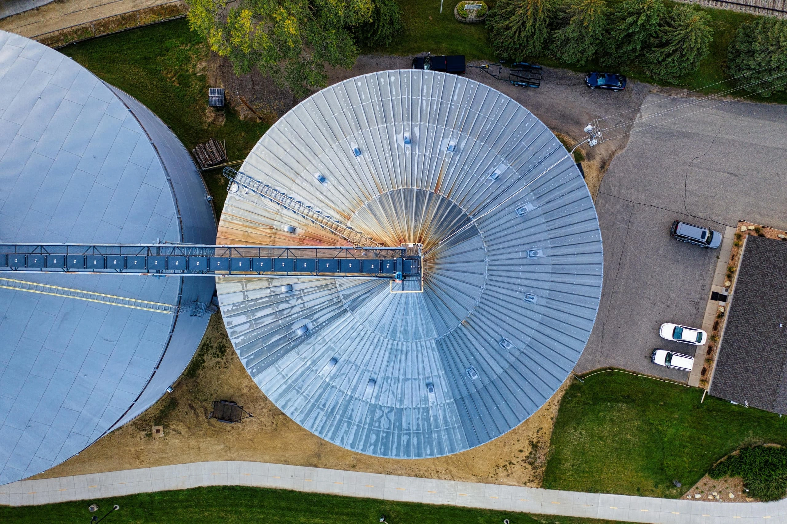 Grain silos from above - commodity inventory and crop-finance context