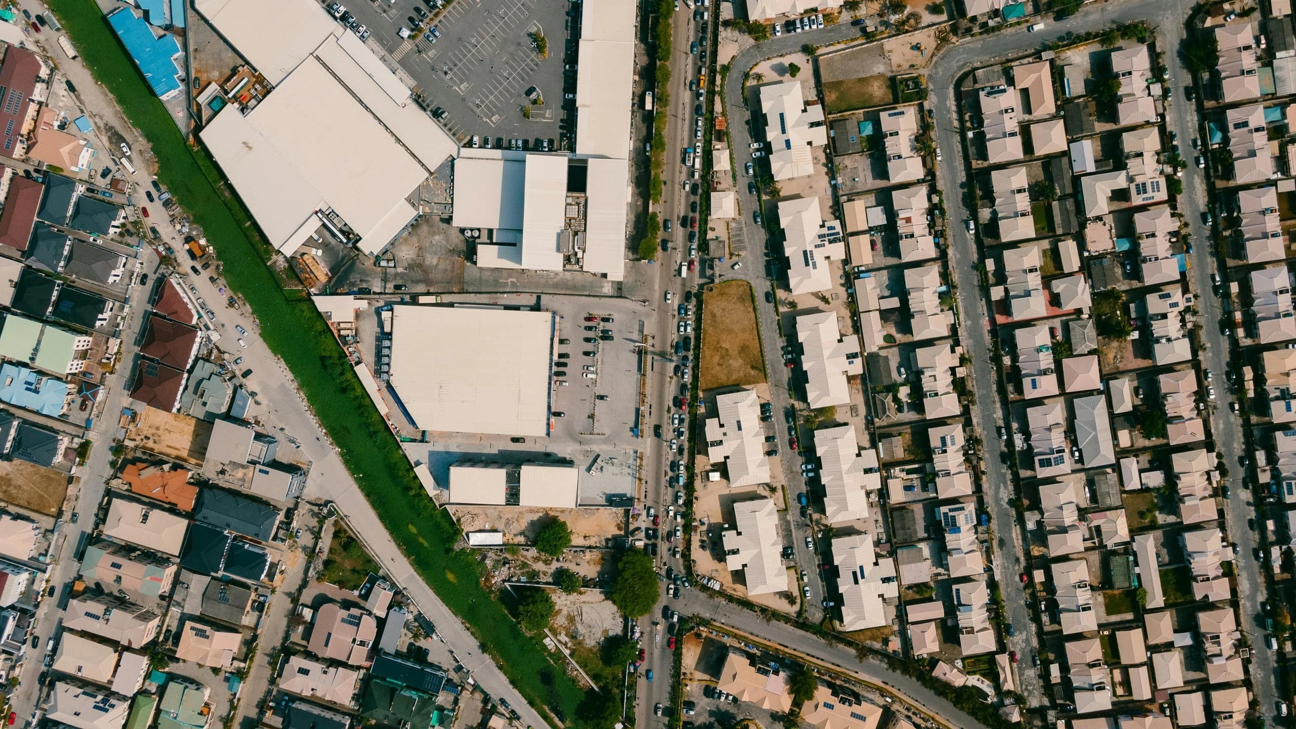 Top-down aerial view of a suburban area - government planning and cadastral context